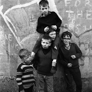 Boys with IRA graffiti, Belfast, Northern Ireland