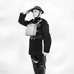 Firefighter in protective fire gear, WW2