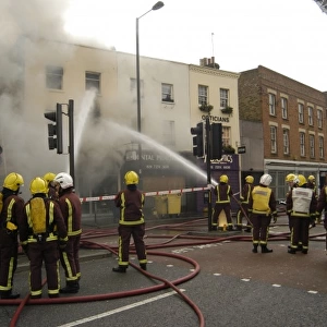 Firefighters at scene of fire, Stockwell Road, Brixton