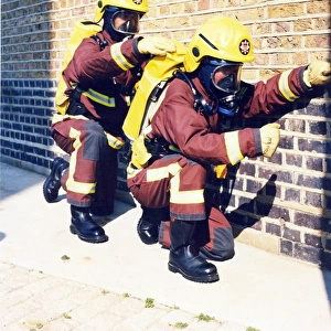 Firefighters in training with breathing apparatus