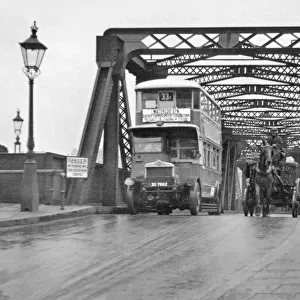 Two forms of transport on a London bridge