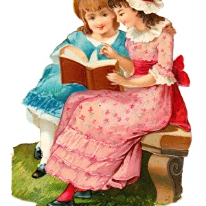 Two girls with book on a Victorian scrap