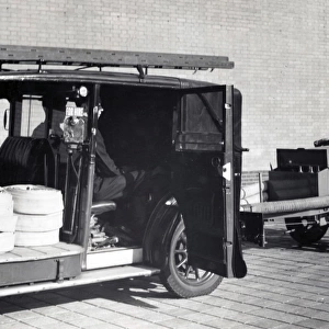 LFB adapted London taxi pulling a trailer pump, WW2