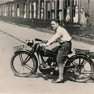 Man on a 1920s Rex-Acme motorcycle