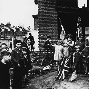 Street celebration with flags, VE Day