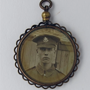 WWI mourning fob with two photographs