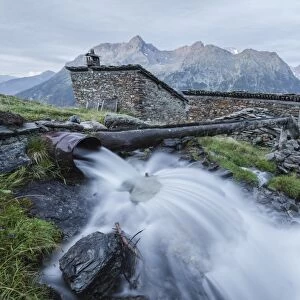 Flowing water of alpine creek, Entova Alp, Malenco Valley, Sondrio province, Valtellina