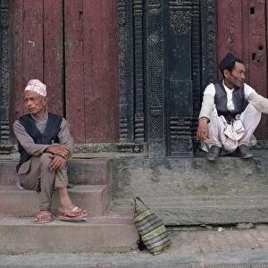 Three men gossiping in Bhaktapur