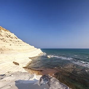 White cliffs known as Scala dei Turchi frame the turquoise sea, Porto Empedocle