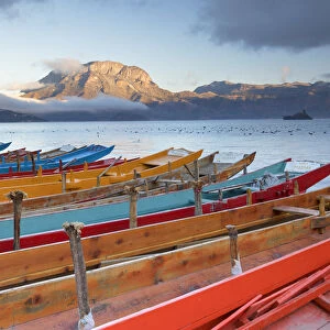Boats on Lugu Lake at dawn, Yunnan, China