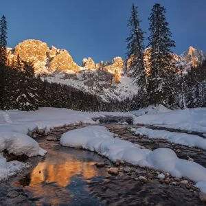 Winter sunset over the St Martins blades, Dolomites, Italy