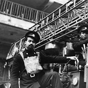 Auxiliary Fire Service crew with fire engine, WW2