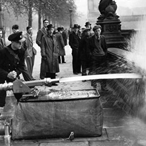 Blitz in London -- demonstrating deluge set, WW2
