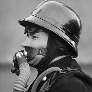Firefighter in new breathing apparatus helmet