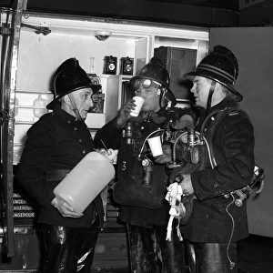 Firefighters in breathing apparatus
