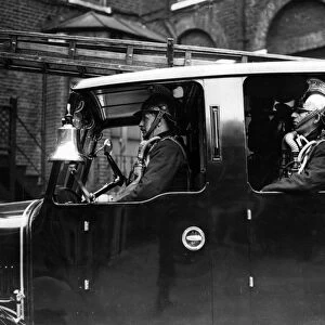 LFB firefighters in enclosed pump vehicle
