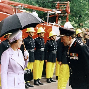 Queen Elizabeth II inspecting firefighters, London