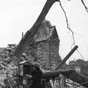 Working fire alarm outside ruined church, WW2