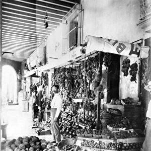 CUBA: FRUIT VENDOR, c1910. Fruit vendor stall at a market in Cuba, c1910