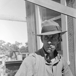 FARMER, 1940. A farmer in Pie Town, New Mexico. Photograph by Russell Lee, 1940