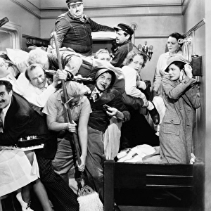 THE MARX BROTHERS, 1935. Some of the ships crew join the Marx Brothers in their cabin in A Night at the Opera, 1935