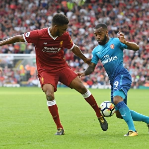 Clash at Anfield: Lacazette vs. Gomez in Premier League Showdown
