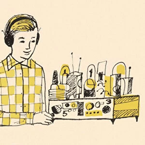 Boy Wearing Headphones and Using Radio