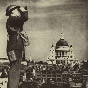 Aircraft spotter looking out for German bombers from a London rooftop during the Blitz, World War II, 5 September 1940 (b / w photo)
