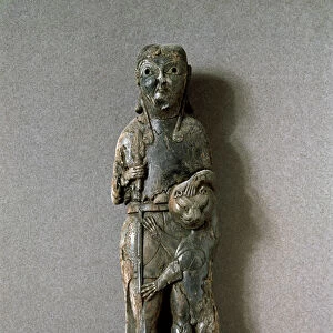 The lion tamer. 7th century BC. ( Ivory sculpture)