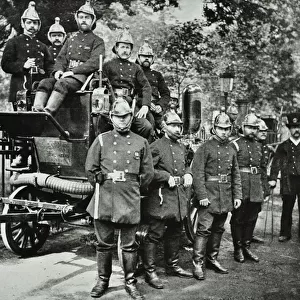 London Fire Brigade: group of firemen, with engine and turncocks, 1895 (b / w photo)