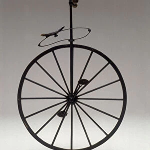 Monocycle with wooden wheels from 1870