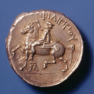 Silver coin of Philip II of Macedon (359-336 BC) depicting horseman riding left