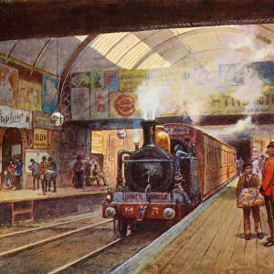Train waiting in an underground station (colour litho)