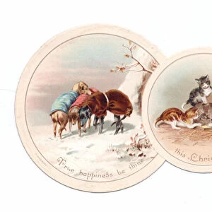 A Victorian oval shaped trio of cards featuring dogs and kittens playing with a mouse