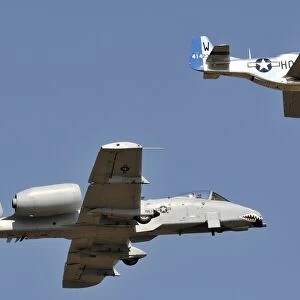 An A-10 Thunderbolt and a P-51 Mustang perform a heritage flight