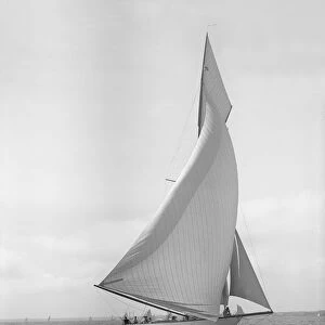 The 15-metre cutter Ostara sailing downwind, 1911. Creator: Kirk & Sons of Cowes
