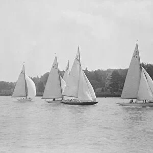 A group of 6 metre boats racing downwind, 1931. Creator: Kirk & Sons of Cowes