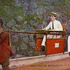 Man being carried on a Sedan chair, Hong kong, 20th century