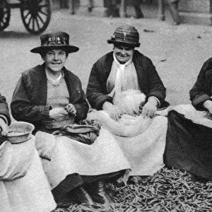 Pea shelling in Covent Garden, London, 1926-1927