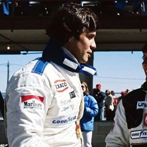 Formula One World Championship: Sixth placed Patrick Tambay McLaren, talks with Jean-Pierre Jarier Jean-Pierre Jarier, who was drafted in to
