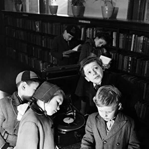 Children listerning to talking books at Bermondsey Library. January 1953 C6332