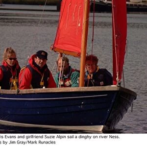 Chris Evans Radio one dj and tv presenter with girlfriend Suzie Alpin sailing a dingy