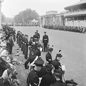 Coronation of King George VI. Royal Scots guards eating sandwiches at Hyde Park