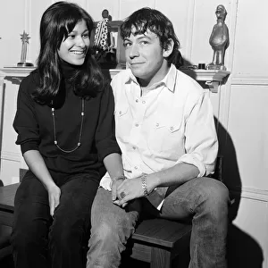 Eric Burdon, lead singer of British rock group The Animals, pictured with his fiancee
