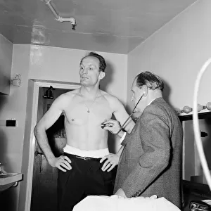 Henry Cooper at the weigh-in for his heavyweight title fight with Muhammad Ali at