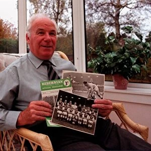 Hibernian football legend Lawrie Reilly at home with mememtoes of his playing career