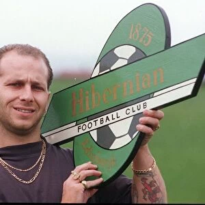 Hibs casual fan Andy Blance from Fife October 1993 holding Hibernian sign member of