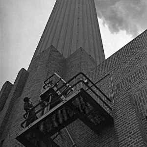 One of the four iconic smokestack at Battersea Power Station, London. 17th January 1934