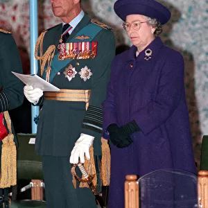 Queen Elizabeth II and Prince Philip presenting colours at RAF Marham. April 1994
