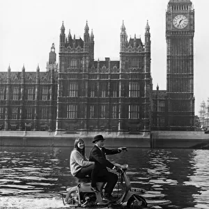 Skipper Hornsby and Stella scoot up the Thames at a fair rate of knots on their scooter